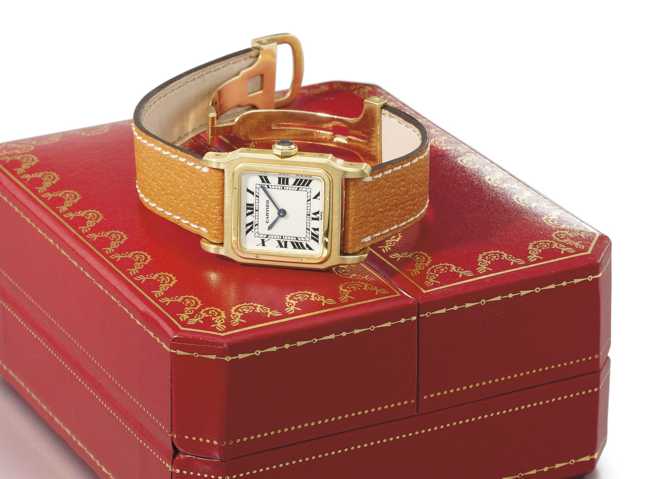 Cartier. An 18K gold square wristwatch