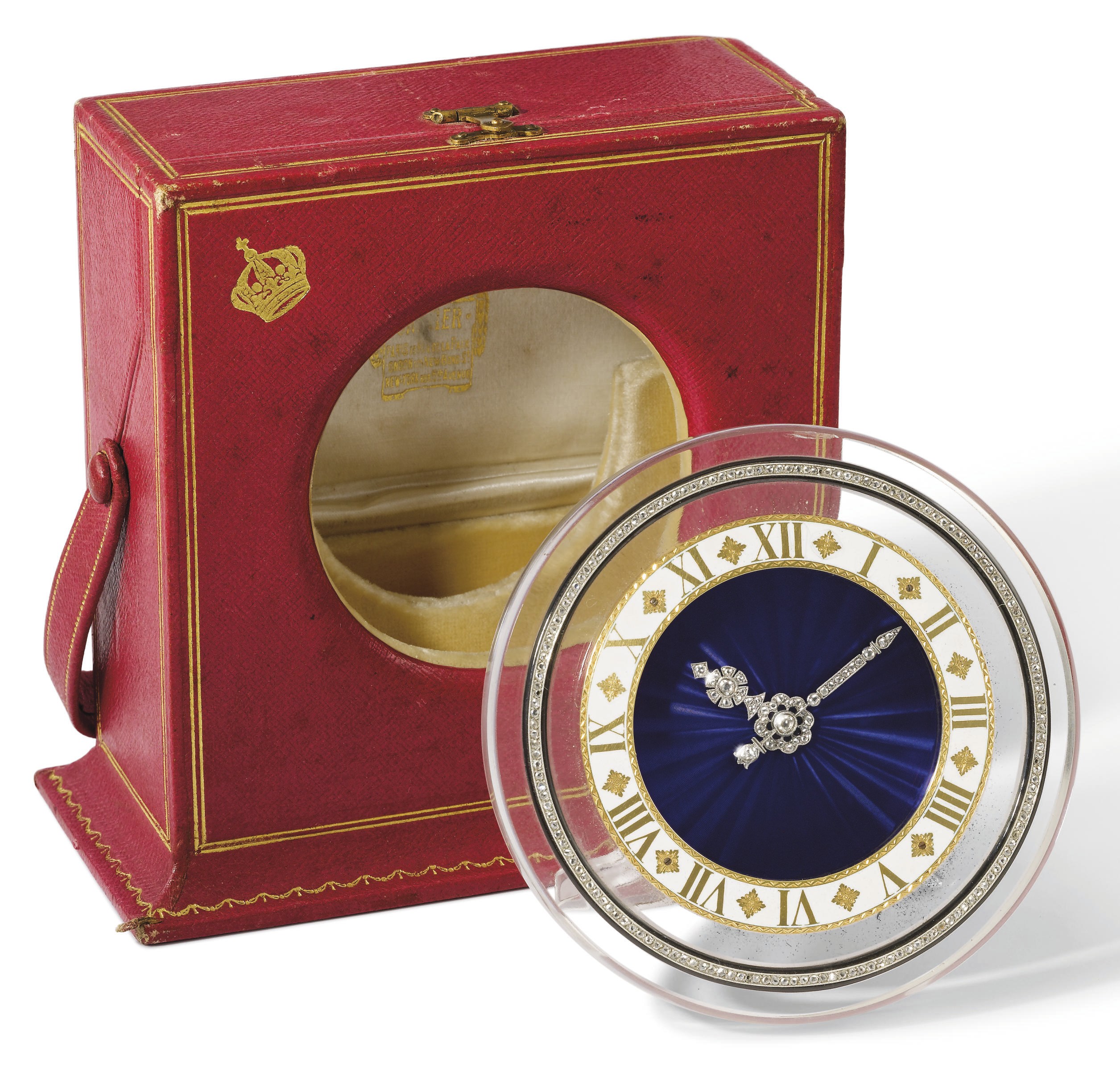 Cartier. A very fine and rare rock crystal, enamel and diamond-set desk clock with box