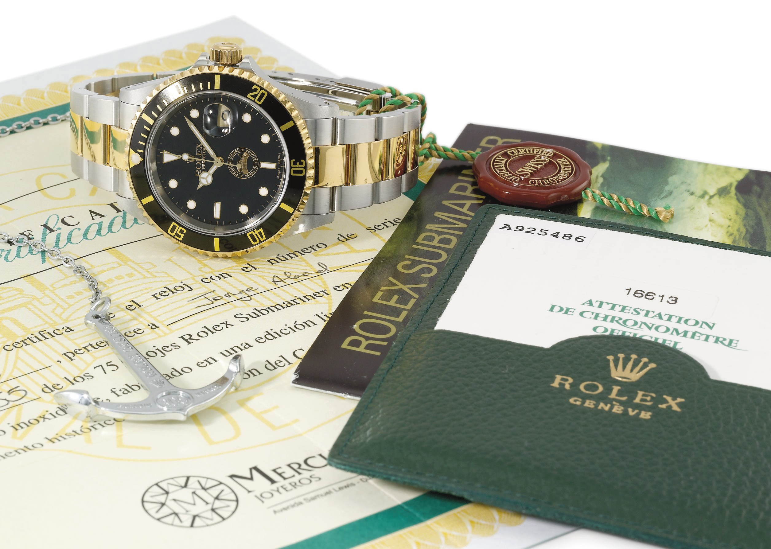 Rolex. A fine and rare stainless steel and 18K gold limited series automatic wristwatch with centre seconds, black dial, date, bracelet, Guarantee and box, made to commemorate the transfer of the Panama Canal from the US to the Republic of Panama