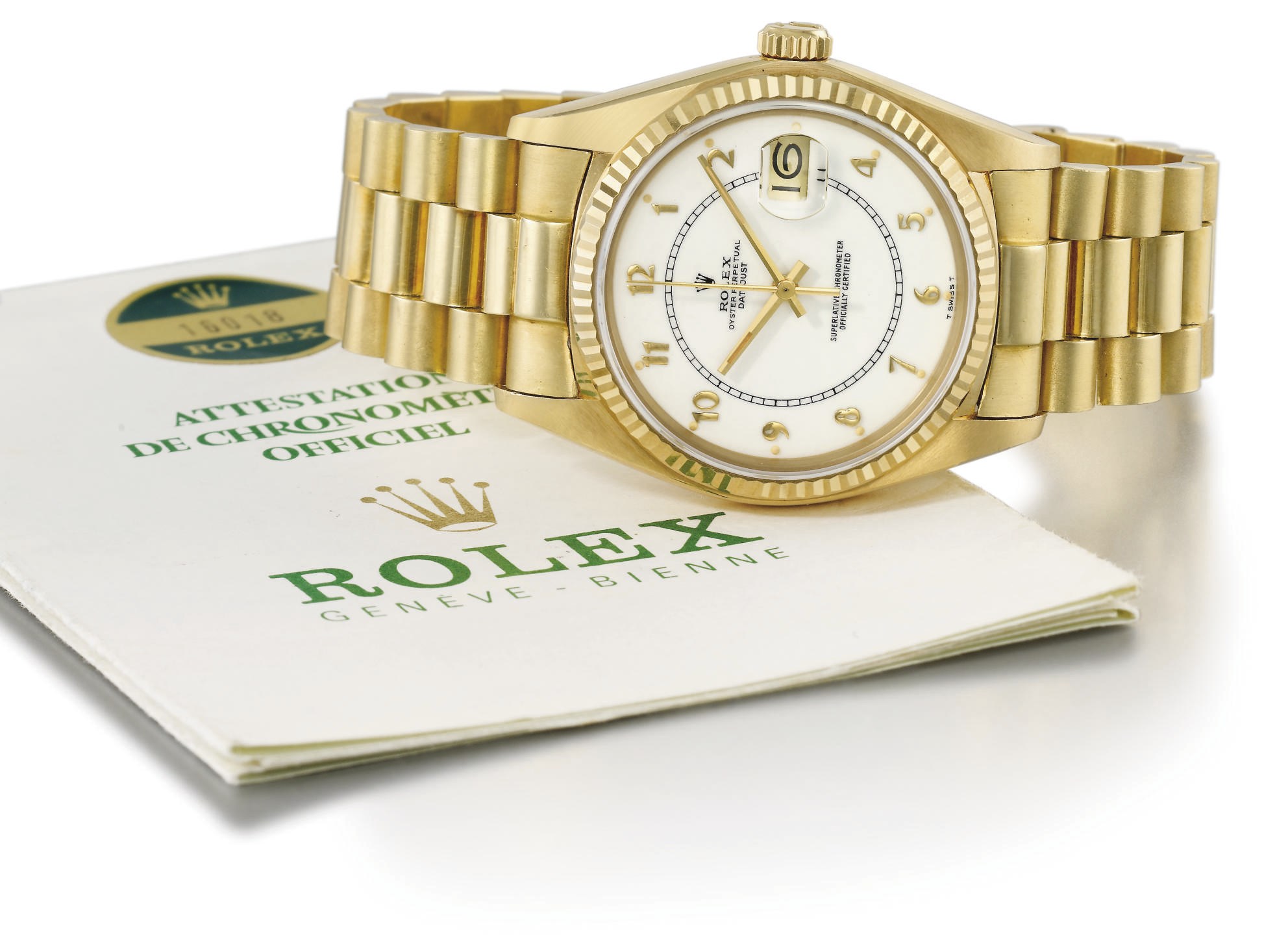 Rolex. An 18K gold automatic wristwatch with sweep centre seconds, date, bracelet and unusual dial