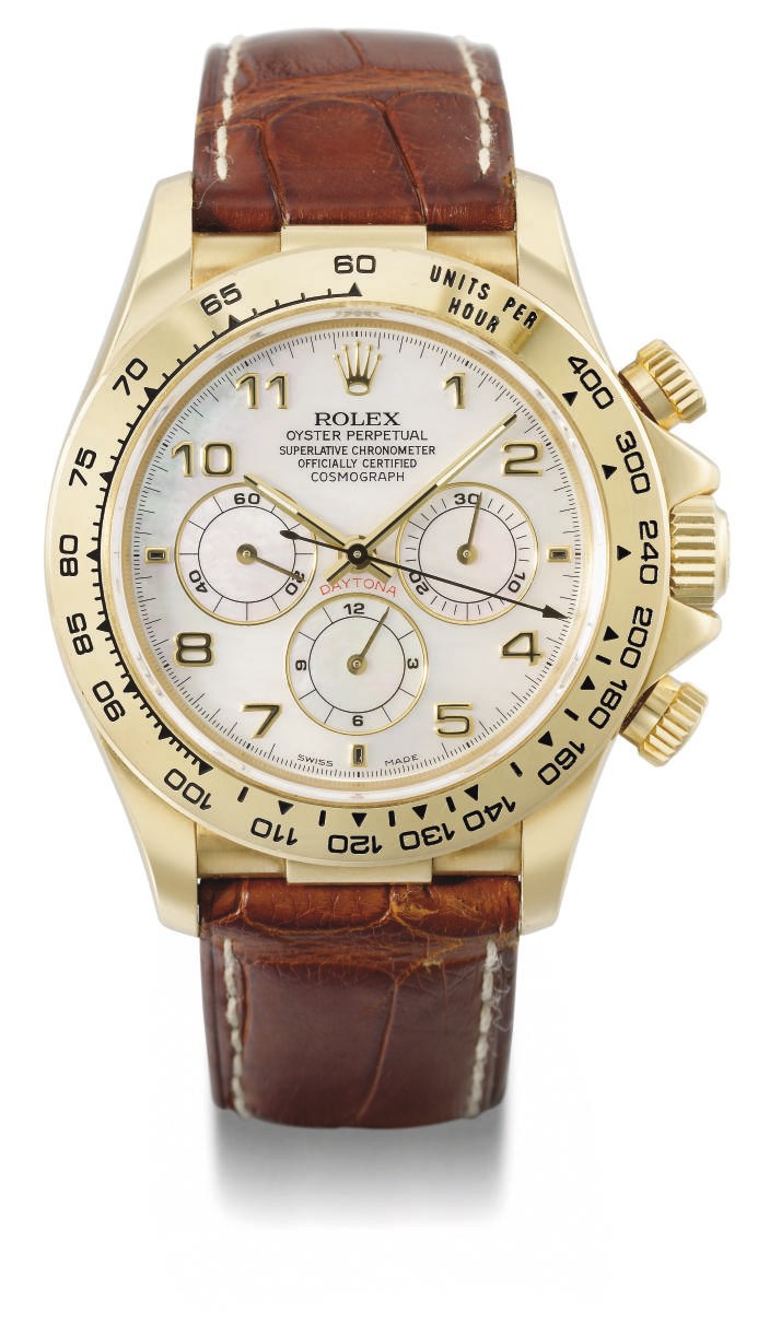 Rolex. An 18K gold automatic chronograph wristwatch with mother-of-pearl dial