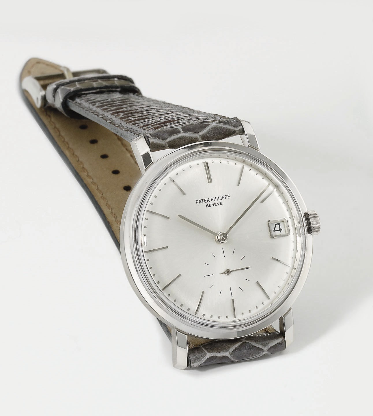 Patek Philippe. A fine 18K white gold automatic wristwatch with date