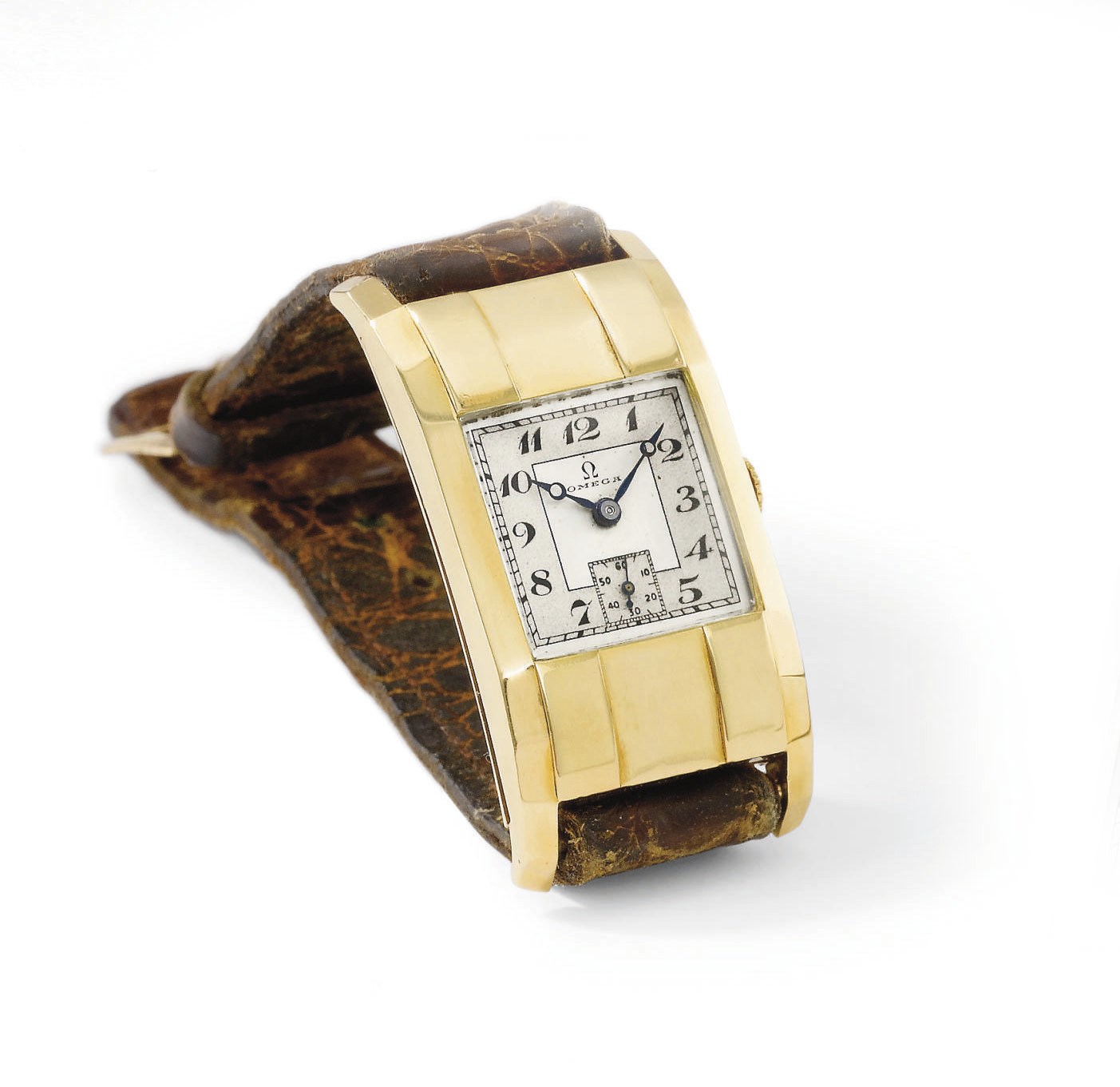 Omega. A fine and rare 18K gold rectangular curved wristwatch with hinged back and two-tone silvered dial