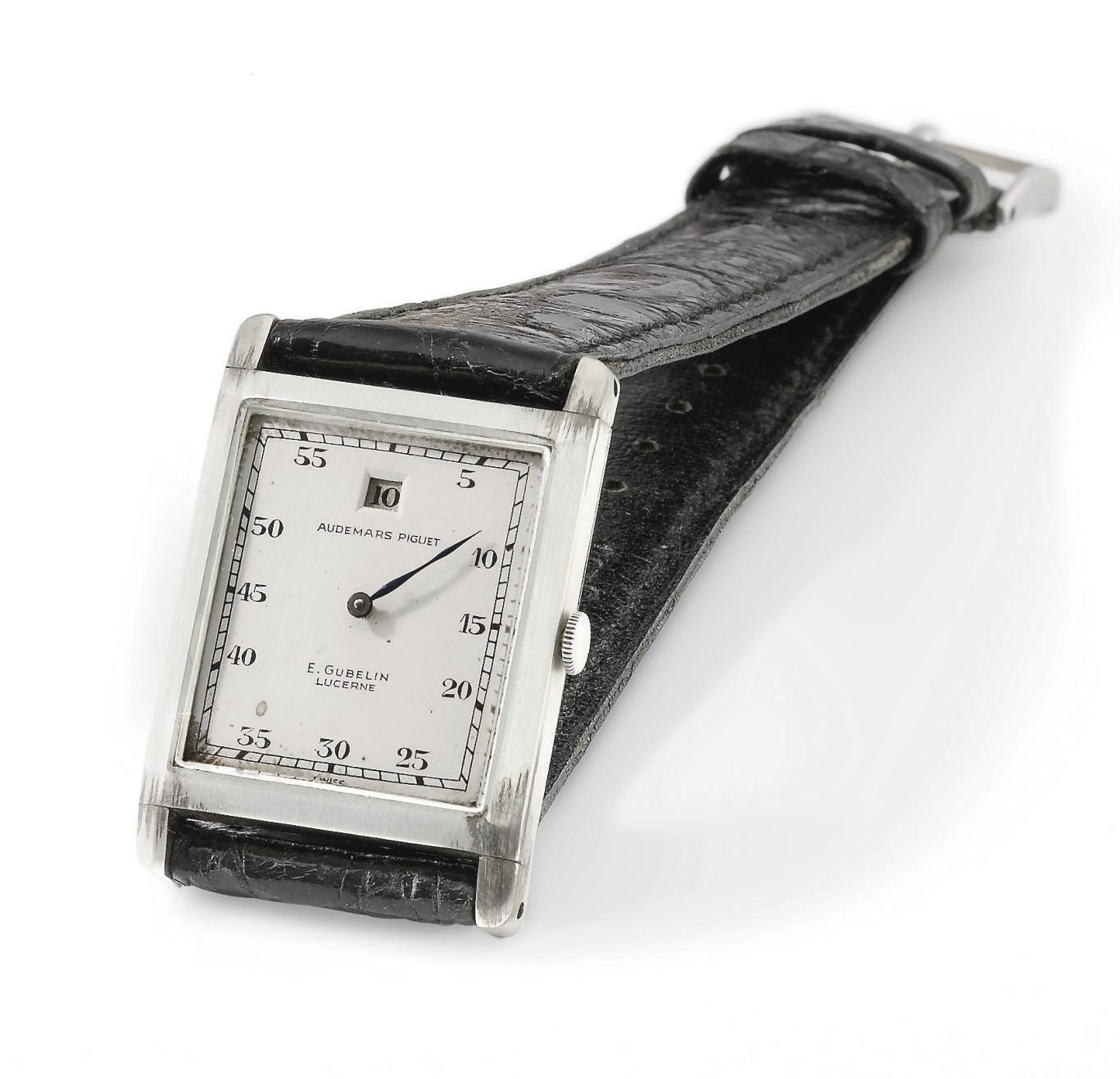 Audemars Piguet. A fine and rare 18K white gold rectangular jump hour wristwatch