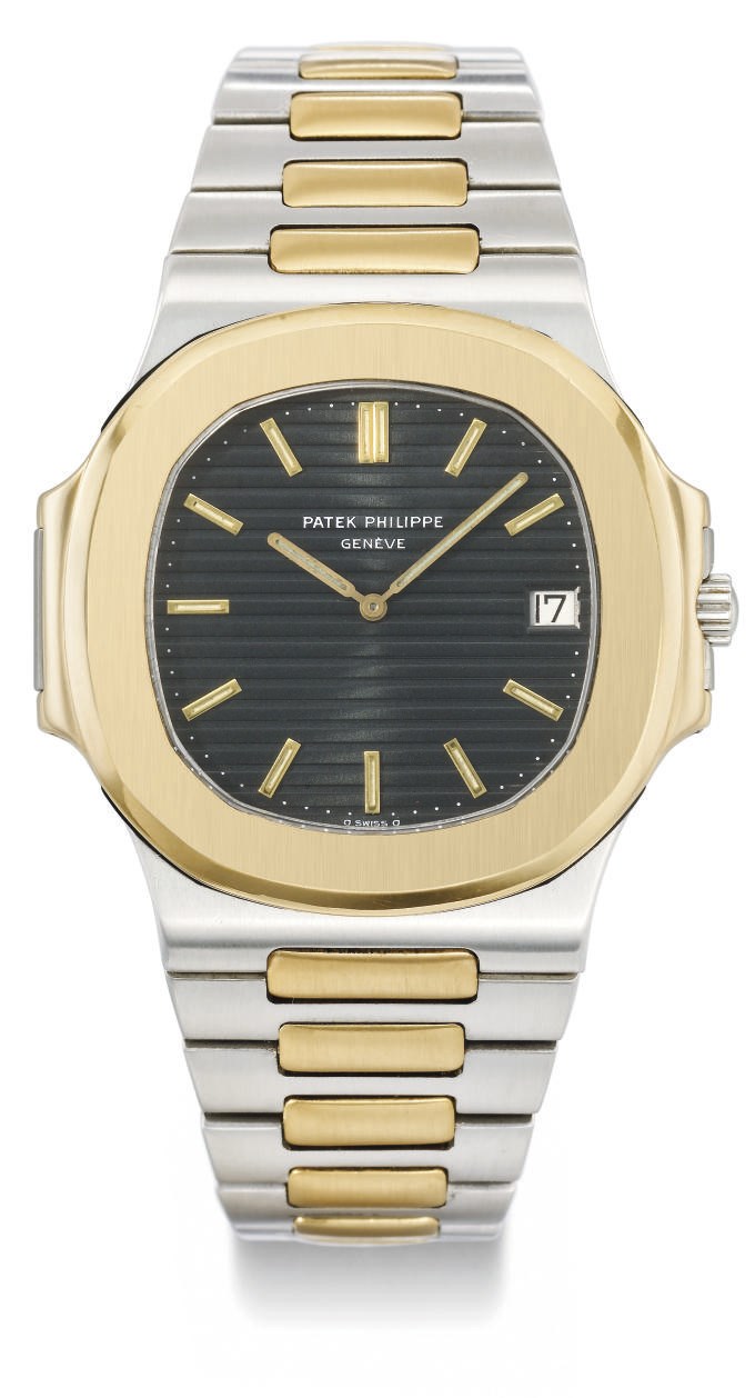 Patek Philippe. A fine and large stainless steel and gold automatic wristwatch with date and bracelet