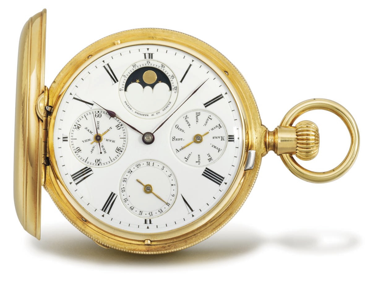 Patek Philippe. A fine, rare and early 18K gold hunter case perpetual calendar keyless lever watch with moon phases