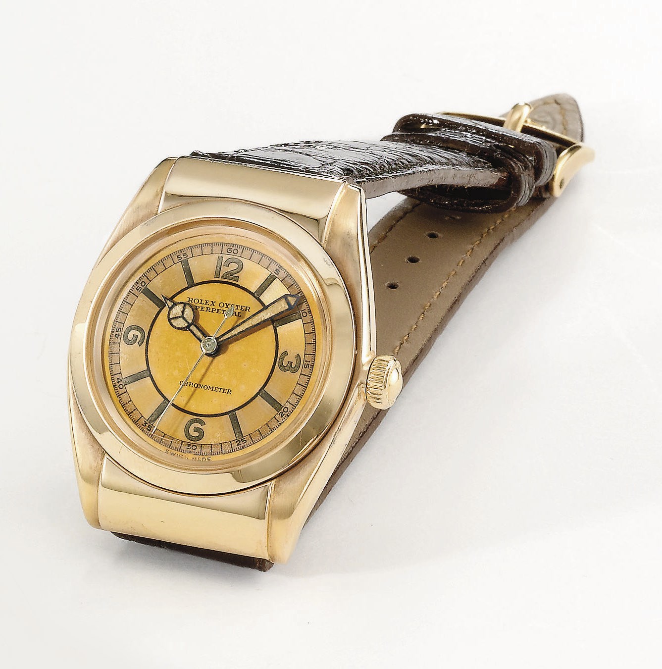 Rolex. A fine, rare and attractive 18K pink gold automatic bubble back wristwatch with sweep centre seconds, two-tone pink dial and hooded lugs