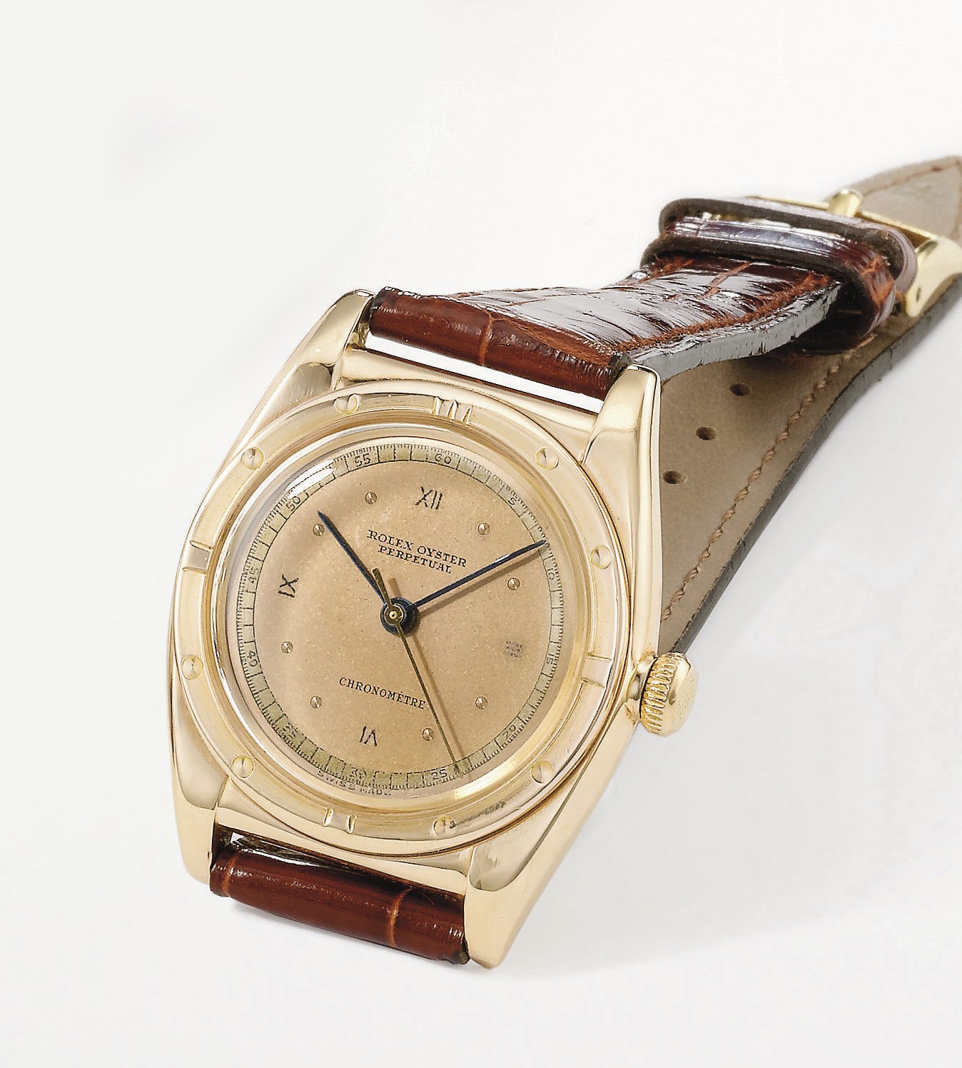 Rolex. An attractive 14K pink gold automatic bubble back wristwatch with sweep centre seconds and pink dial