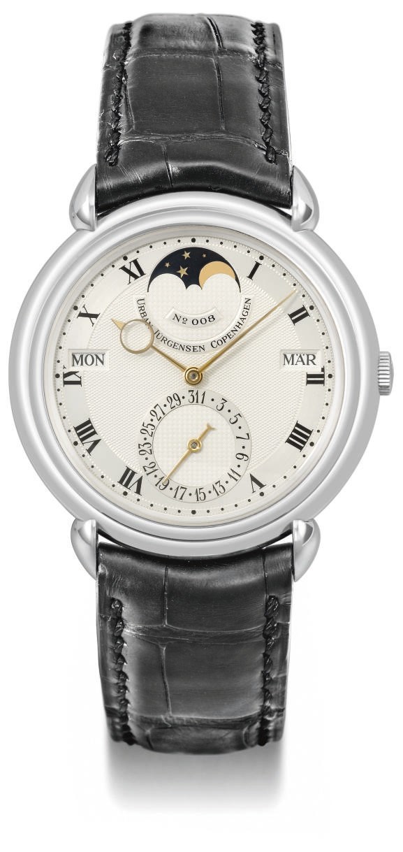 Urban Jürgensen. A fine and rare platinum automatic perpetual calendar wristwatch with power reserve and moon phases
