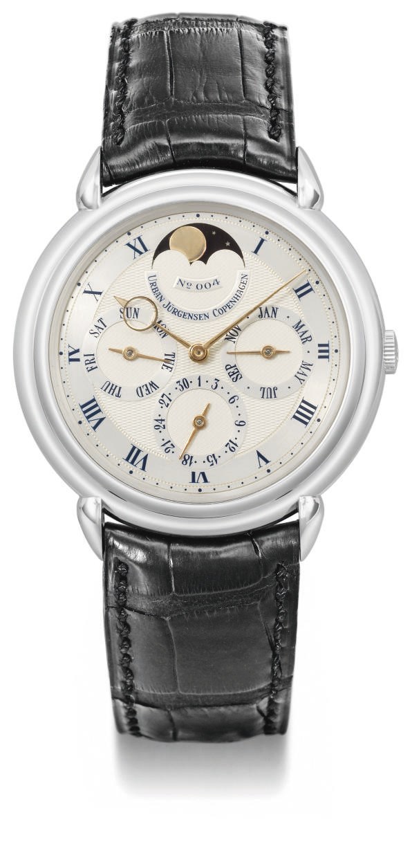 Urban Jürgensen. A fine and rare platinum limited automatic perpetual calendar wristwatch with moon phases