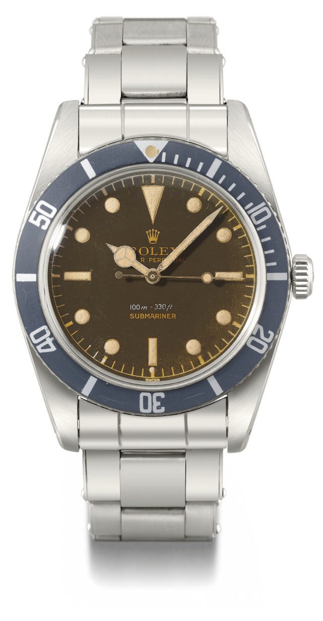 Rolex. An attractive and rare stainless steel automatic wristwatch with sweep centre seconds, brown exclamation dial, bracelet and box