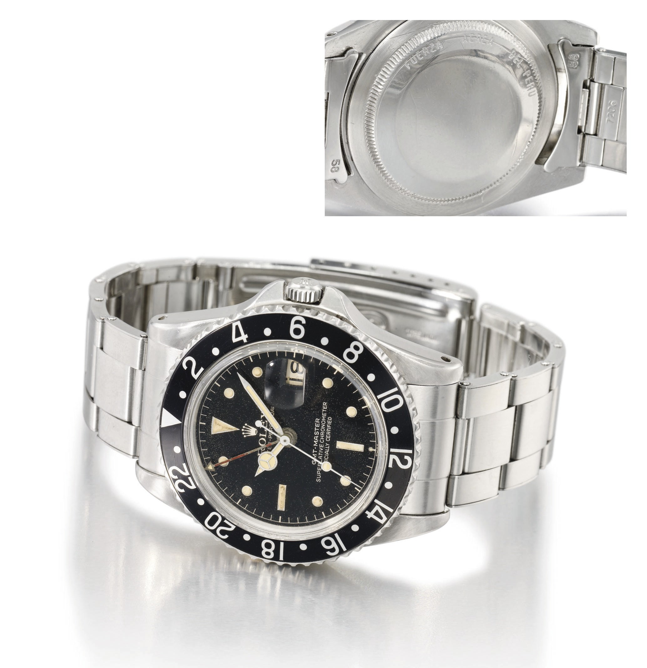 Rolex. A fine and rare stainless steel automatic dual time wristwatch with sweep centre seconds, date, explanation dial and bracelet, made for the Peruvian Airforce