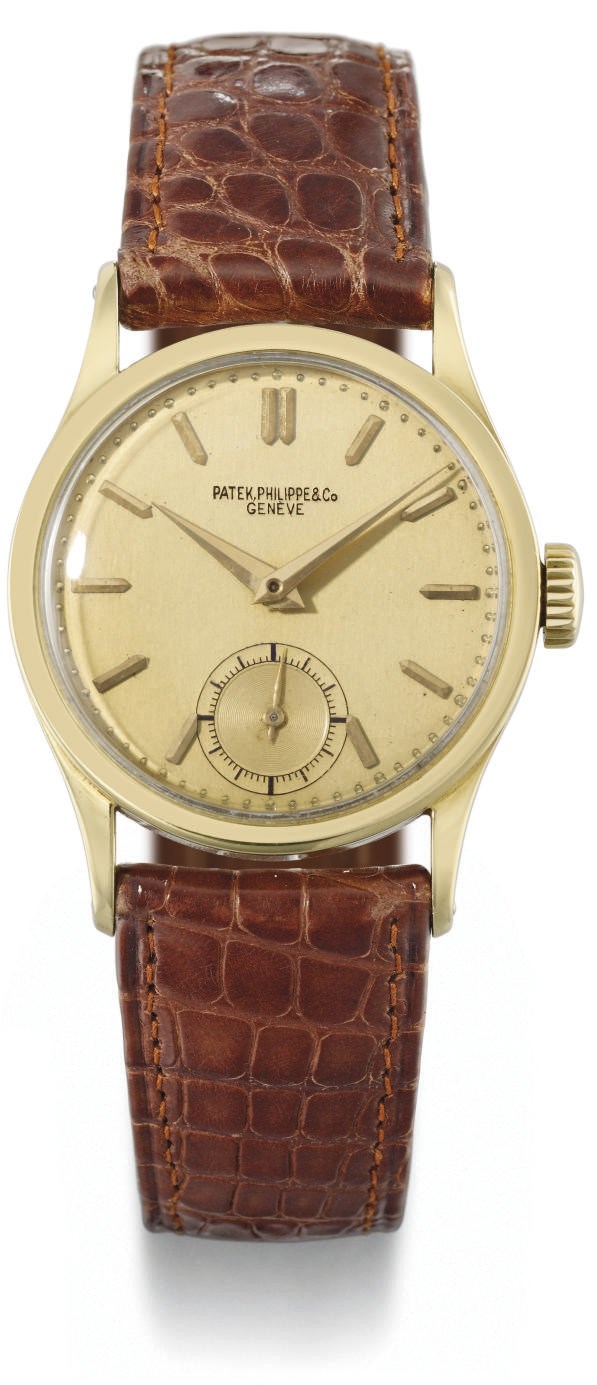 Patek Philippe. An attractive 18K gold wristwatch with champagne dial