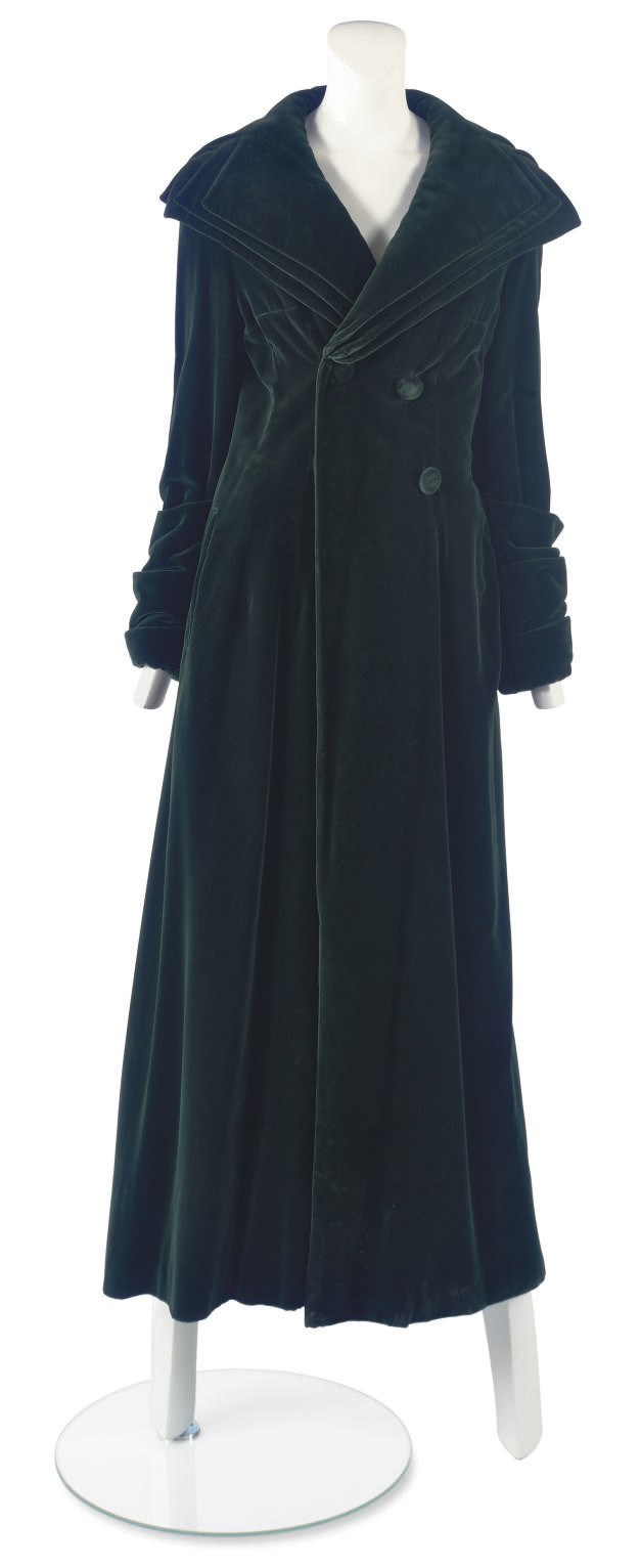 THEA PORTER (1927-2000)
A BOTTLE GREEN VELVET GREATCOAT IN THE REGENCY STYLE