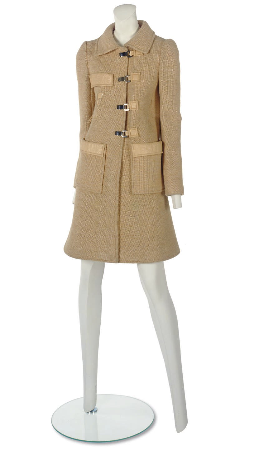 ANDRÉ COURRÈGES (B.1923)
A KNITTED COAT OF APRICOT WOOL