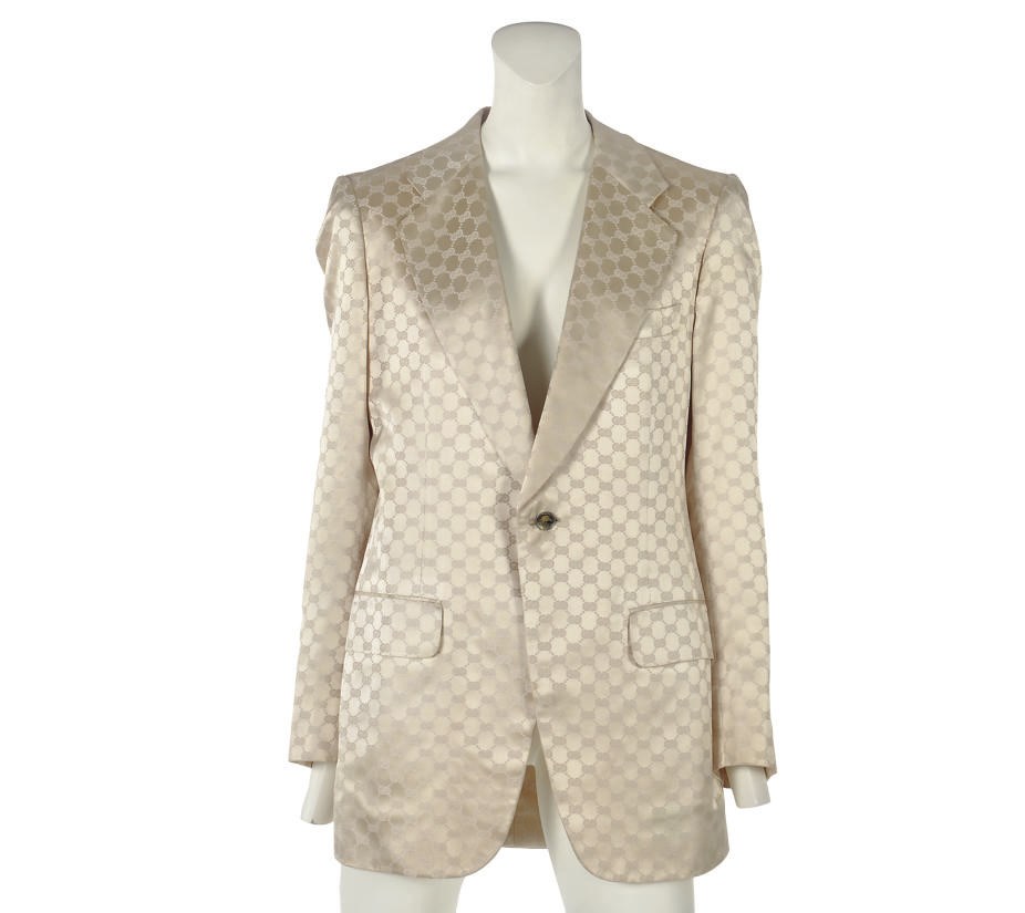 GUCCI (F.1906)
A GENTLEMAN'S EVENING JACKET OF IVORY MONOGRAMMED SATIN