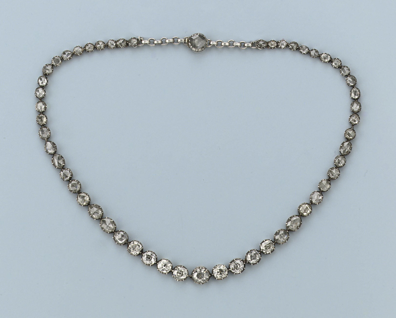 AN ANTIQUE DIAMOND RIVIERE NECKLACE
