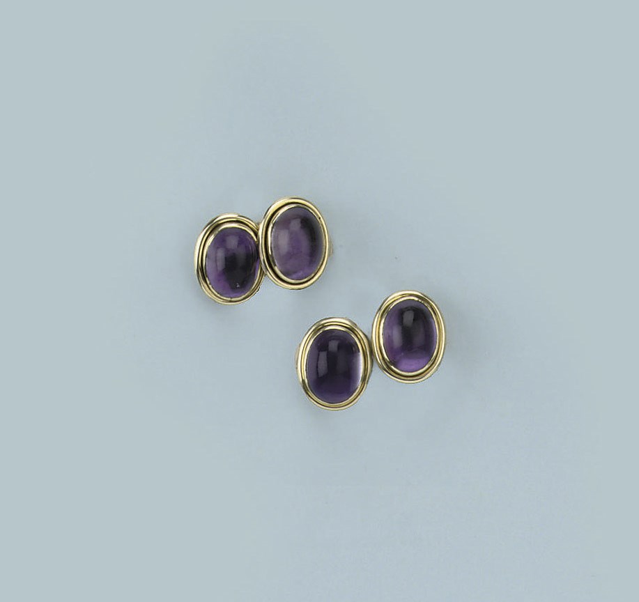 A PAIR OF AMETHYST CUFF LINKS