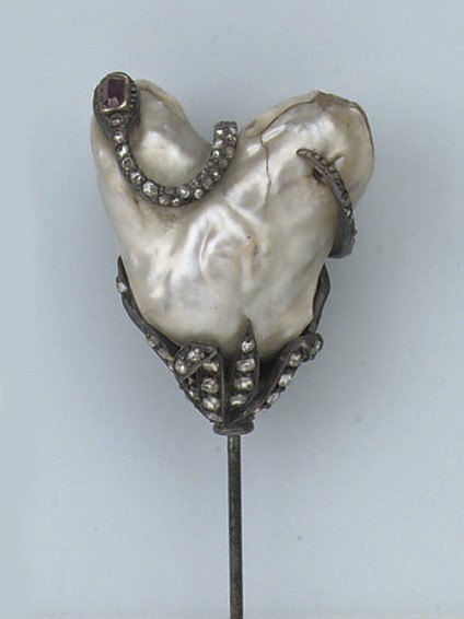AN ANTIQUE NATURAL PEARL AND DIAMOND HAT PIN