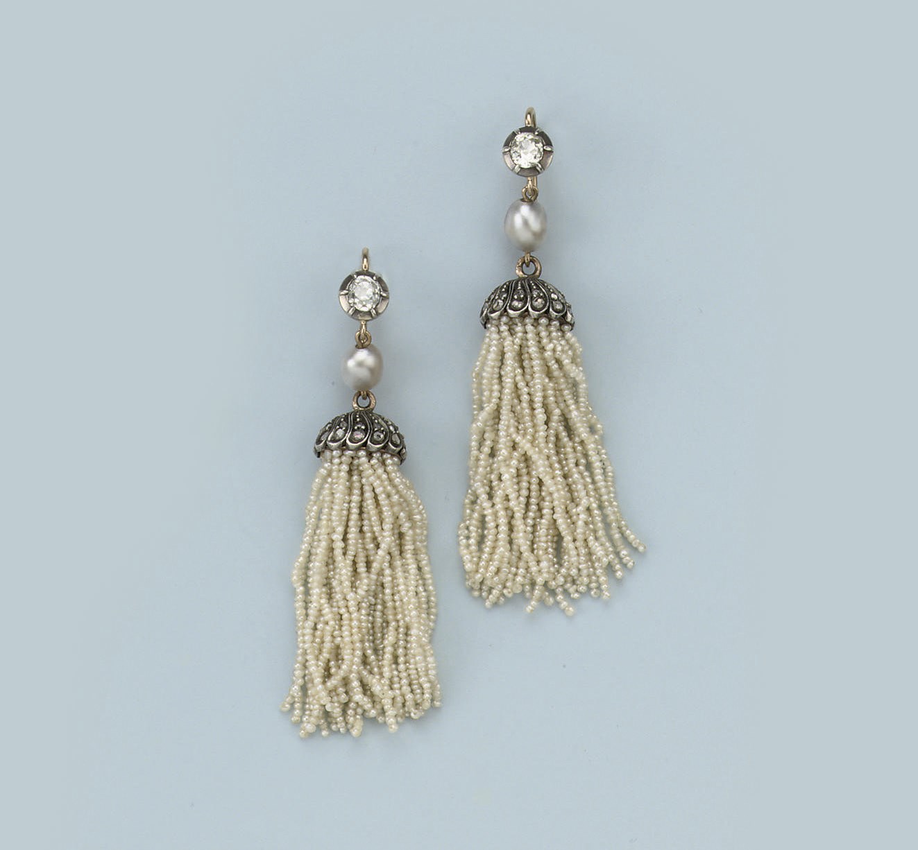 A PAIR OF SEEDPEARL AND DIAMOND EARRINGS