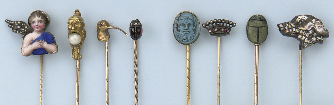 A COLLECTION OF EIGHT ANTIQUE TIE PINS