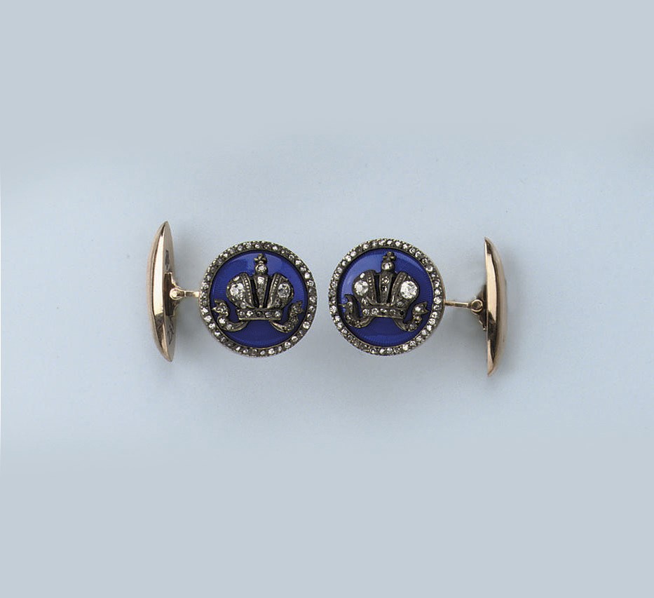 A PAIR OF BLUE ENAMEL AND DIAMOND CUFF LINKS