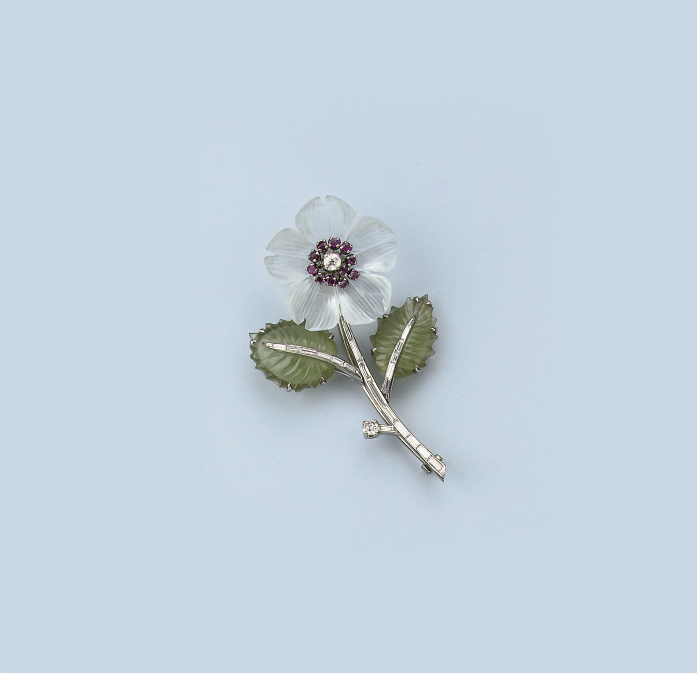 A CARVED GEM-SET AND DIAMOND BROOCH