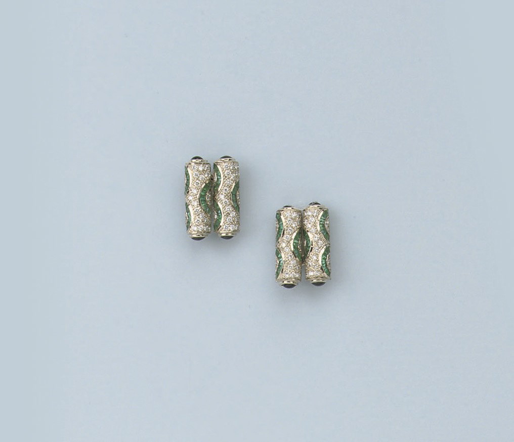 A PAIR OF EMERALD AND DIAMOND CUFF LINKS