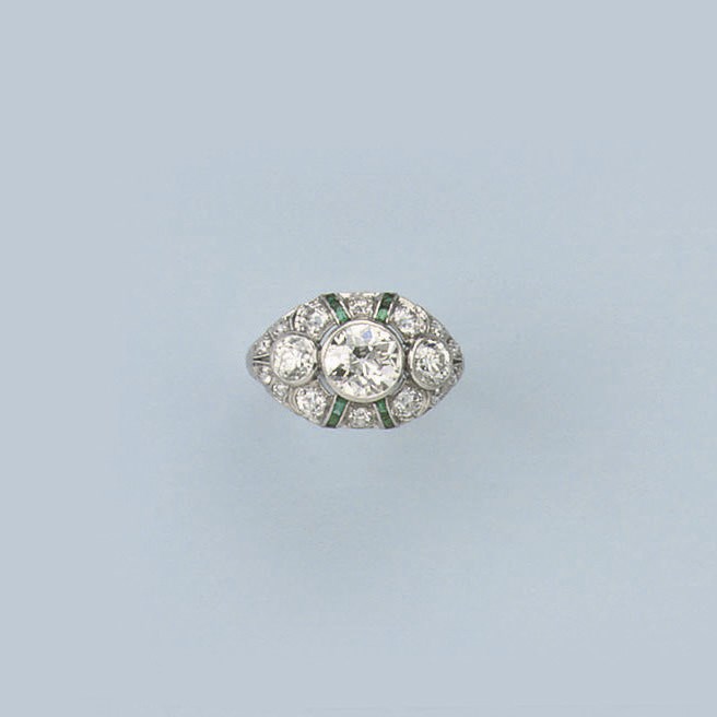A BELLE EPOQUE EMERALD AND DIAMOND RING