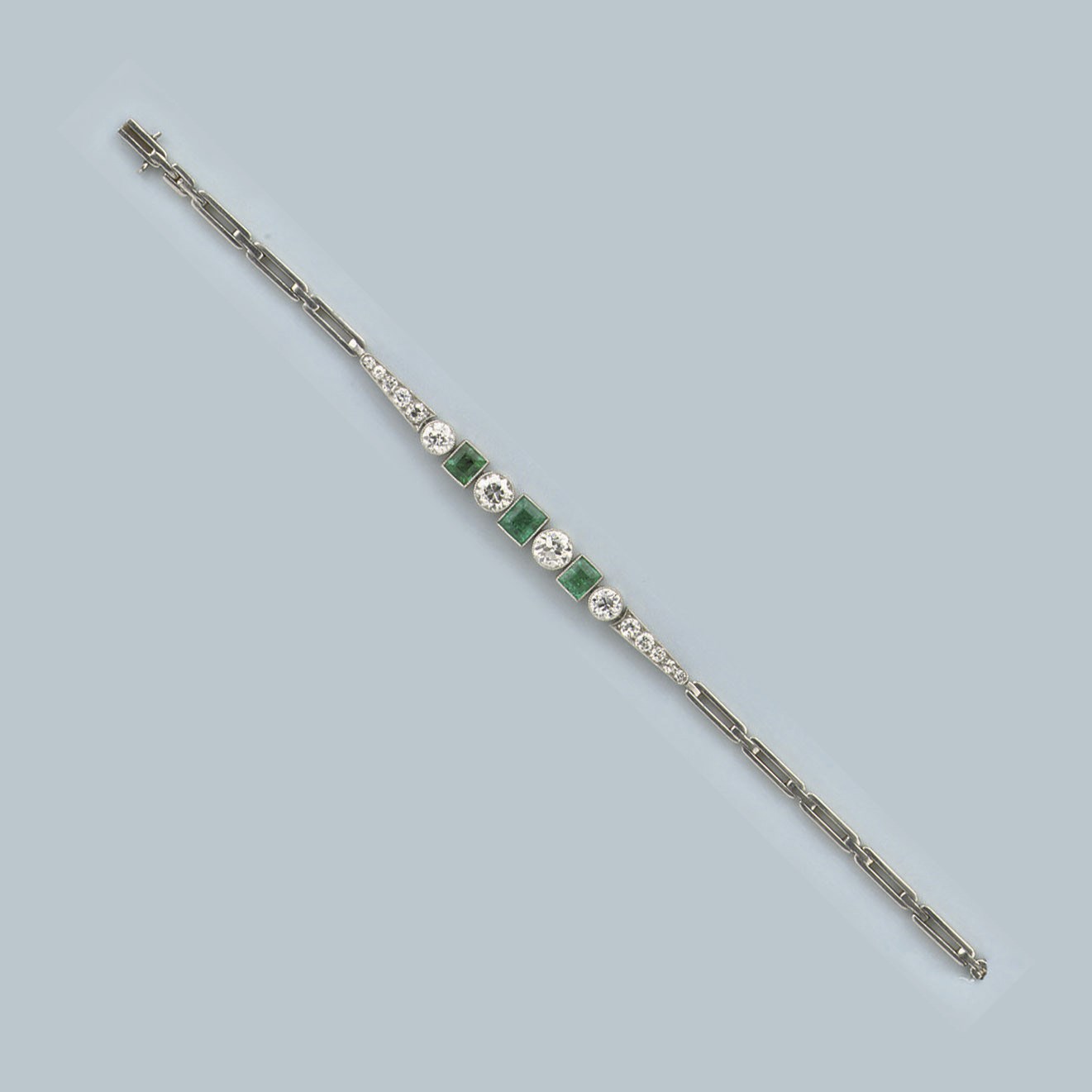 AN EMERALD AND DIAMOND BRACELET