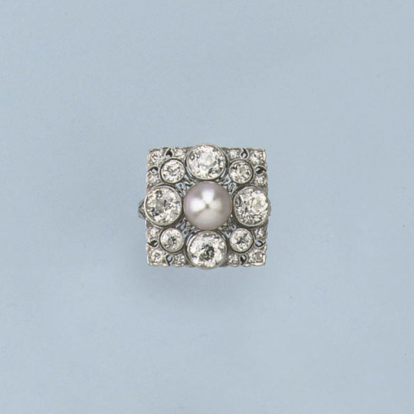 A FINE BELLE EPOQUE NATURAL PEARL AND DIAMOND RING