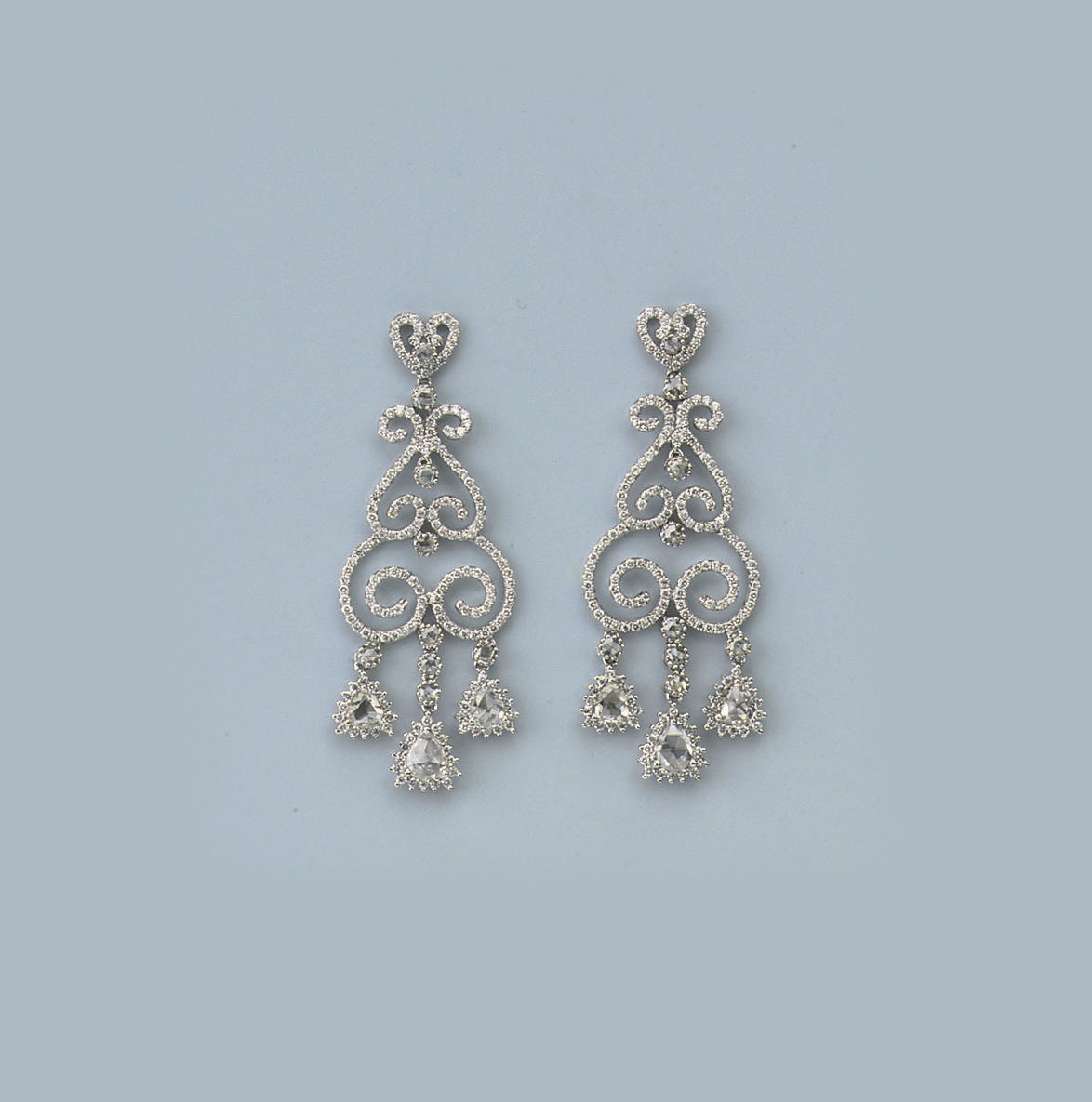 A PAIR OF DIAMOND EARRINGS