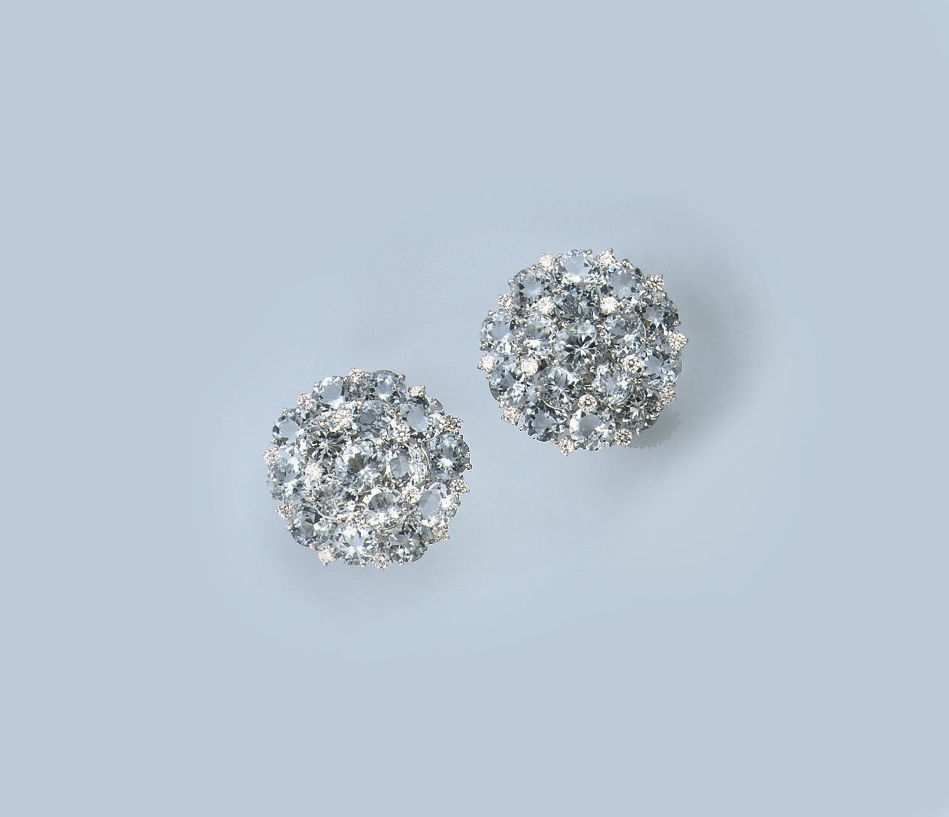 A PAIR OF AQUAMARINE AND DIAMOND EARCLIPS
