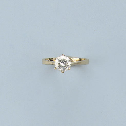 A DIAMOND SINGLE STONE RING