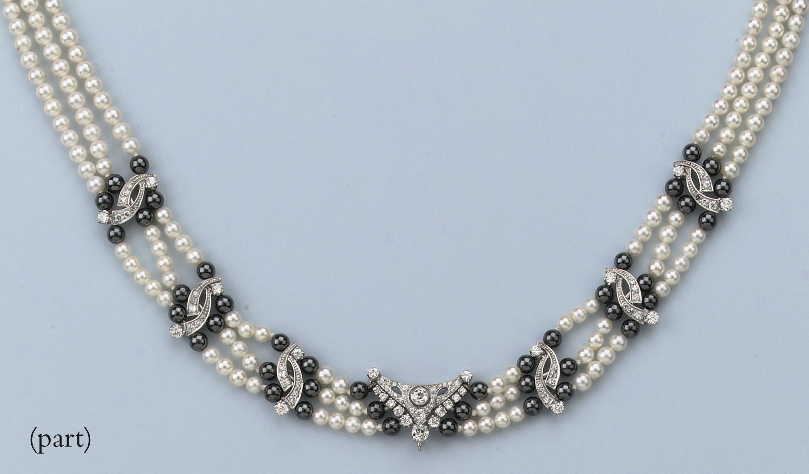 A CULTURED PEARL AND DIAMOND CHOKER WITH MATCHING EARRINGS