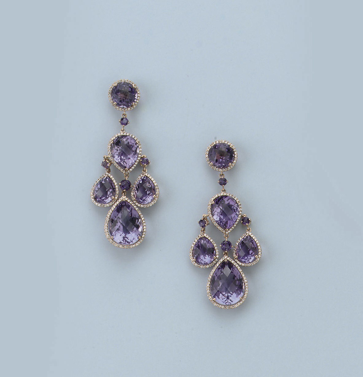 A PAIR OF AMETHYST AND DIAMOND EARRINGS
