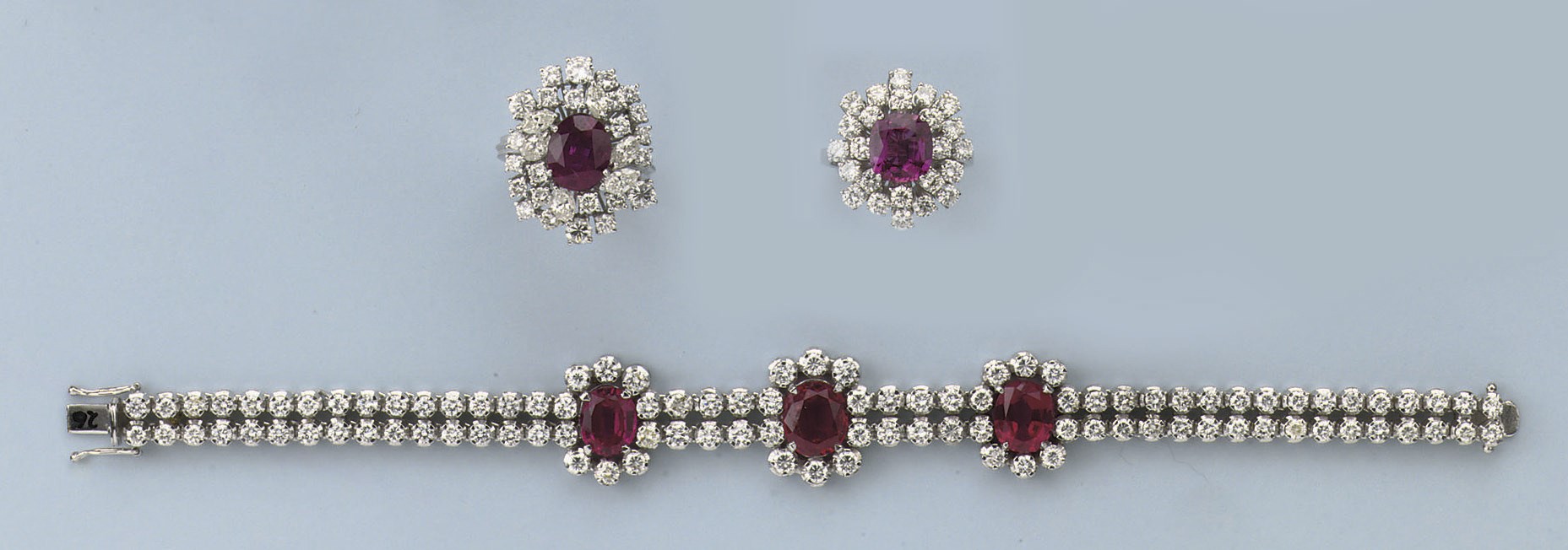 A PAIR OF RUBY AND DIAMOND RINGS AND A SYNTHETIC RUBY AND DIAMOND BRACELET