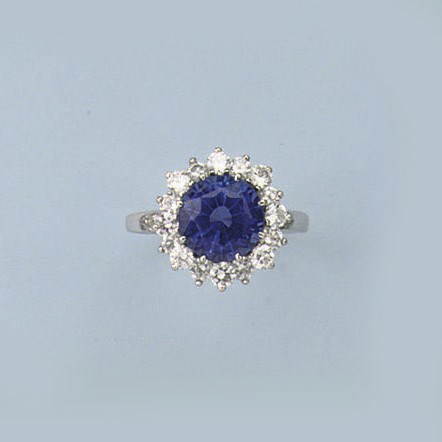 A TANZANITE AND DIAMOND RING