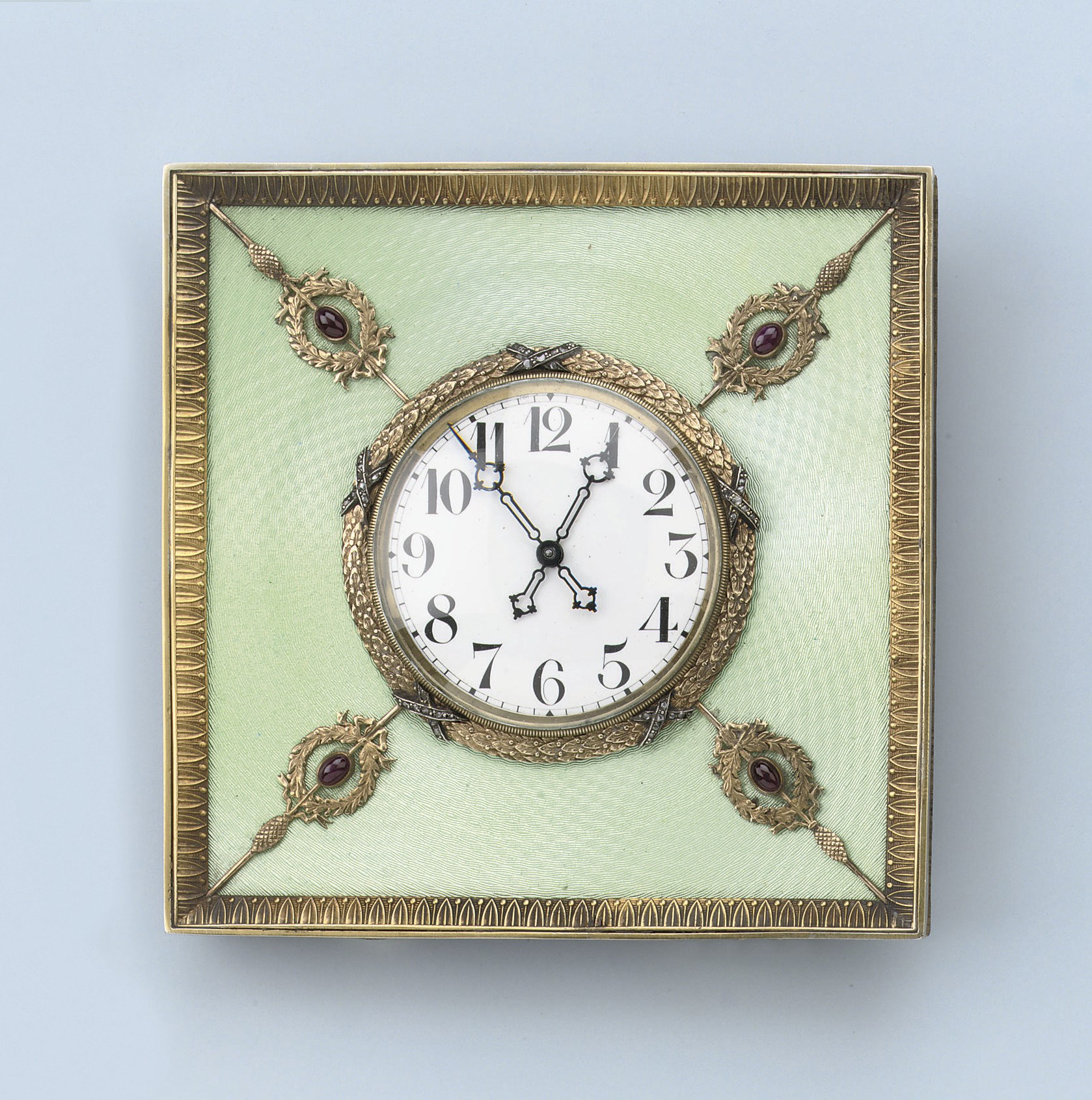 AN ENAMEL AND GEM-SET TABLE CLOCK
