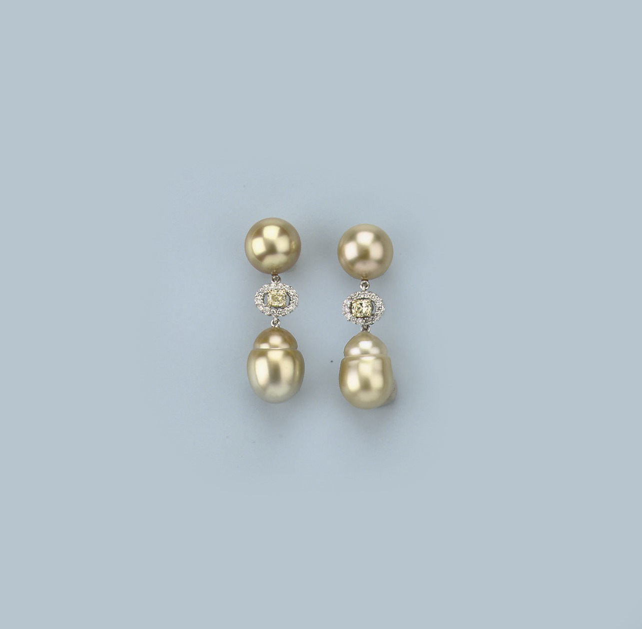 A PAIR OF SOUTH SEA CULTURED PEARL AND DIAMOND EARSTUDS