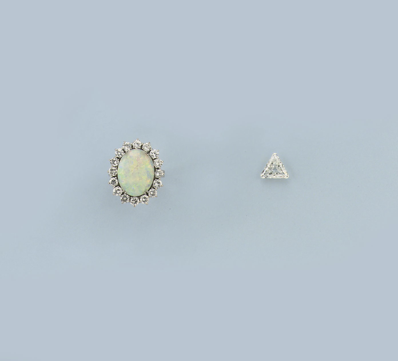 A DIAMOND PENDANT AND AN OPAL AND DIAMOND RING