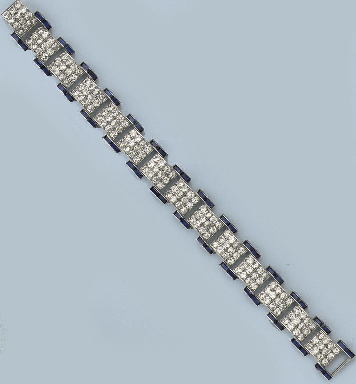 AN ART DECO SAPPHIRE AND DIAMOND BRACELET, BY CARTIER