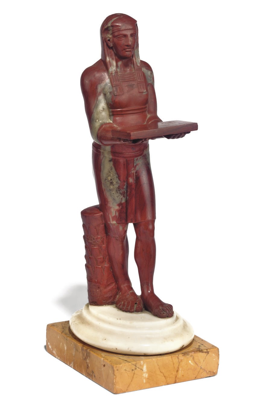 AN ITALIAN ROSSO ANTICO FIGURE OF ANTINUOUS