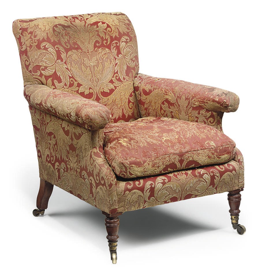 A VICTORIAN WALNUT EASY ARMCHAIR