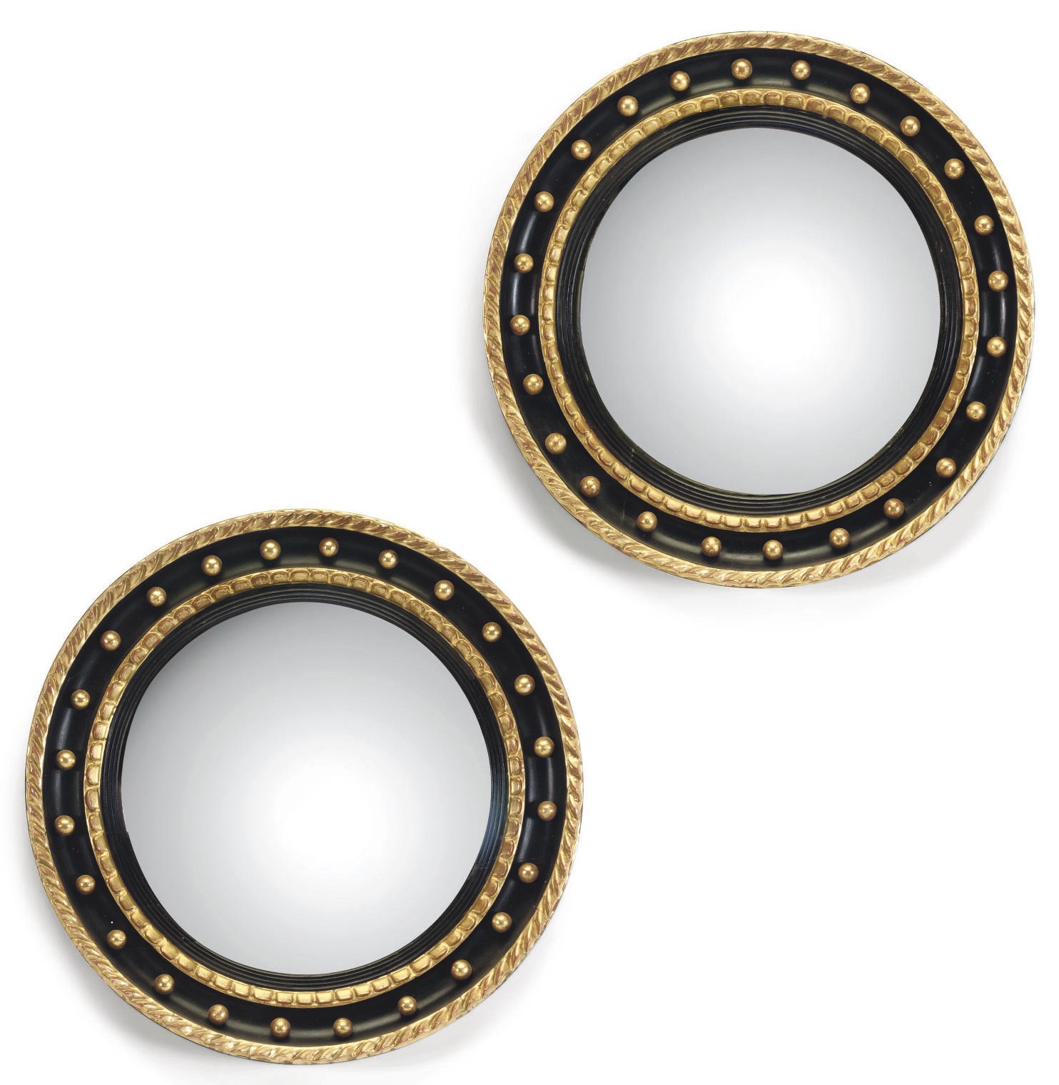 A PAIR OF BLACK PAINTED AND PARCEL-GILT CONVEX MIRRORS
