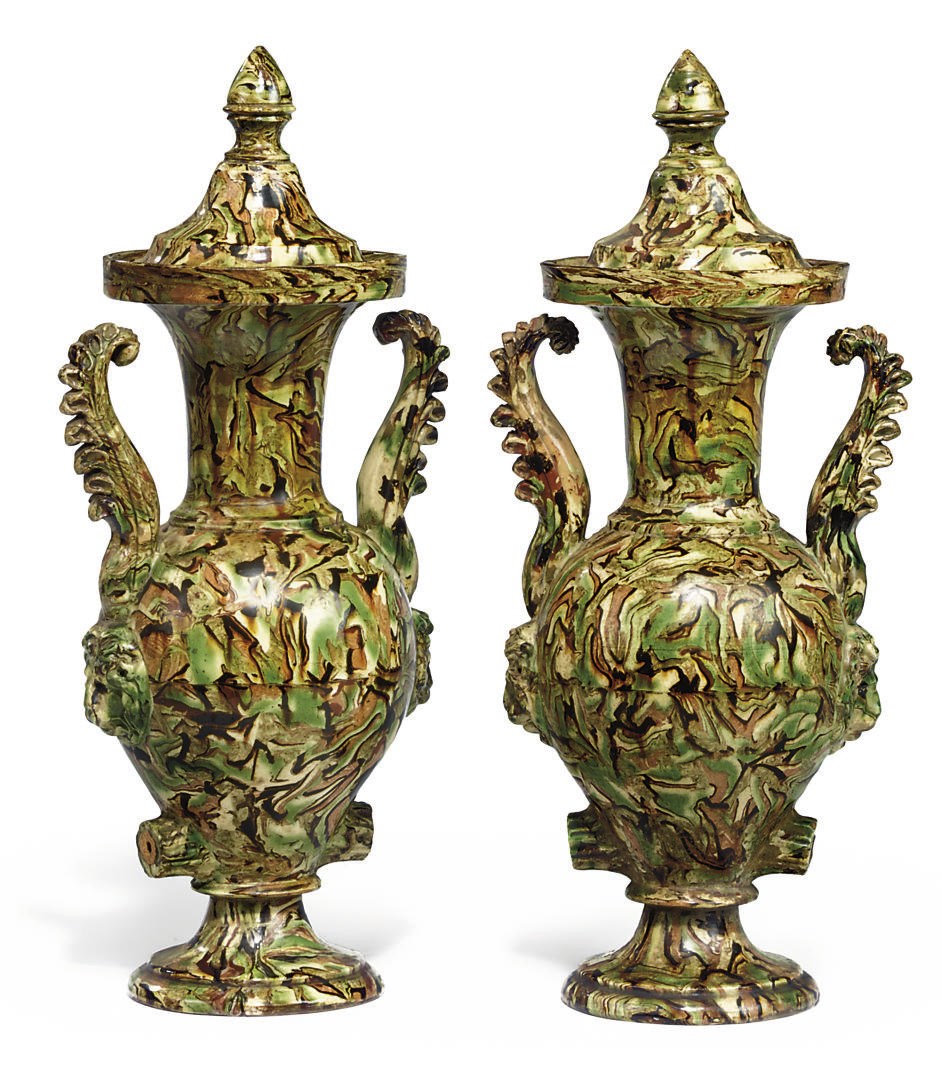 A PAIR OF FRENCH POTTERY MARBLED VASES AND COVERS