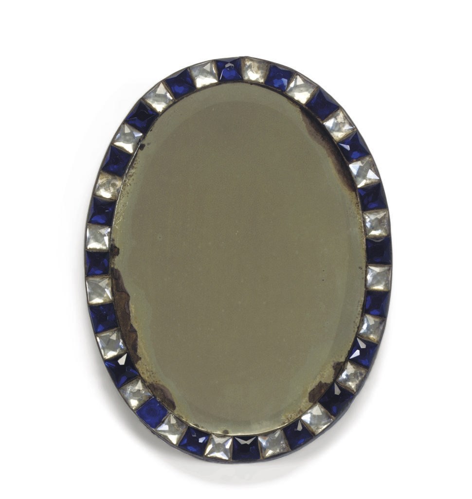 A SMALL IRISH GEORGE III CUT-GLASS OVAL MIRROR