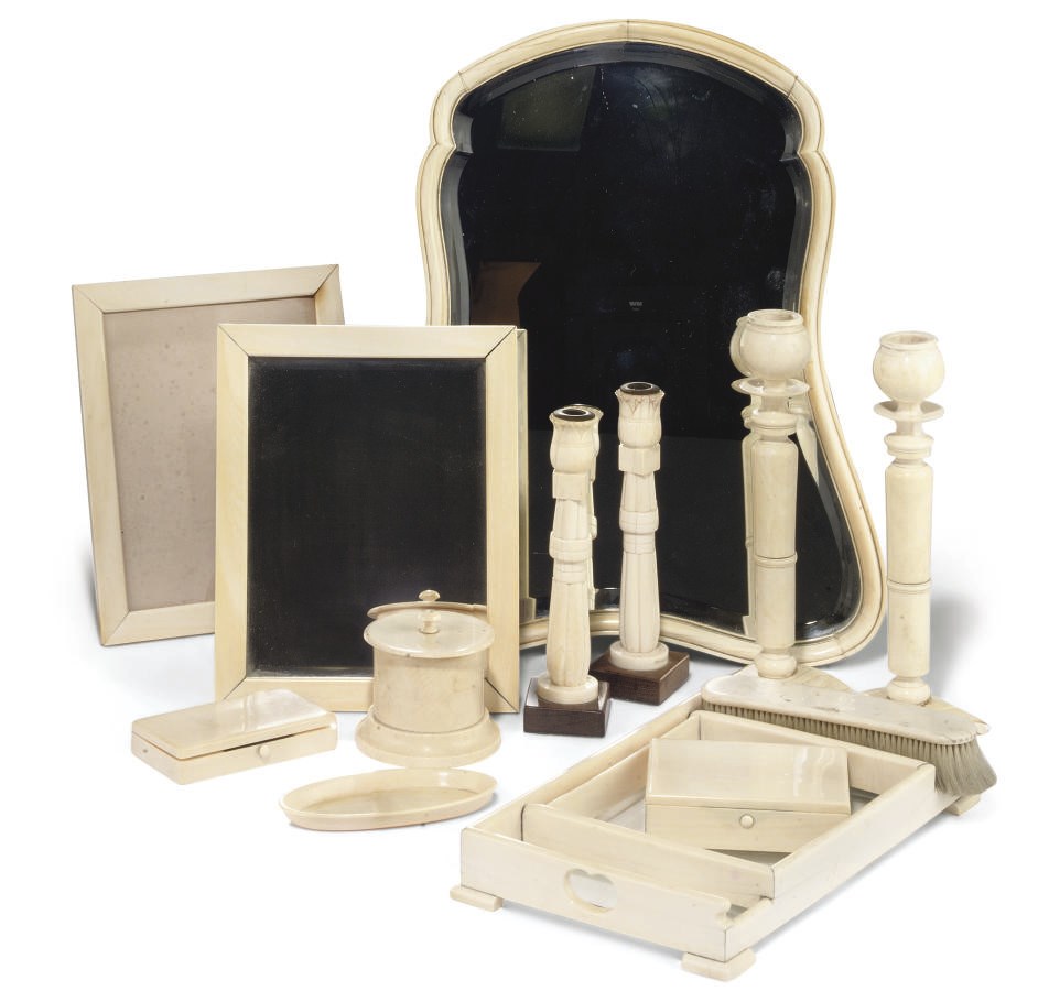 A GROUP OF THIRTEEN EUROPEAN AND INDIAN IVORY DRESSING TABLE OBJECTS