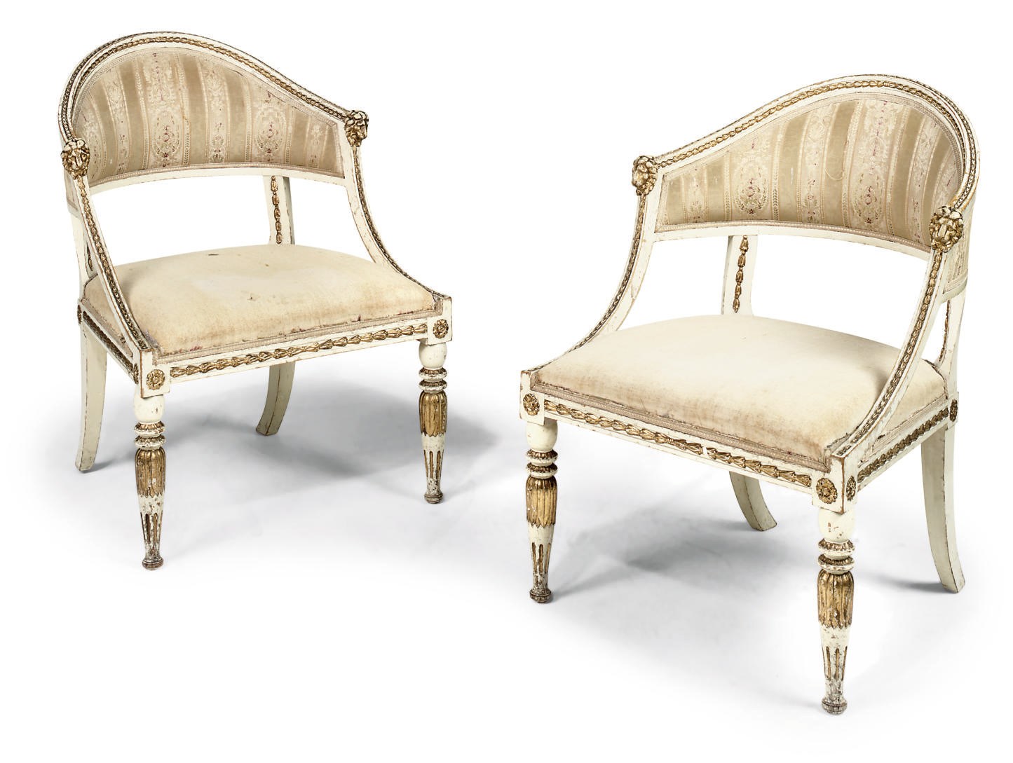 A PAIR OF SWEDISH PARCEL-GILT COMPOSITION AND WHITE PAINTED ARMCHAIRS