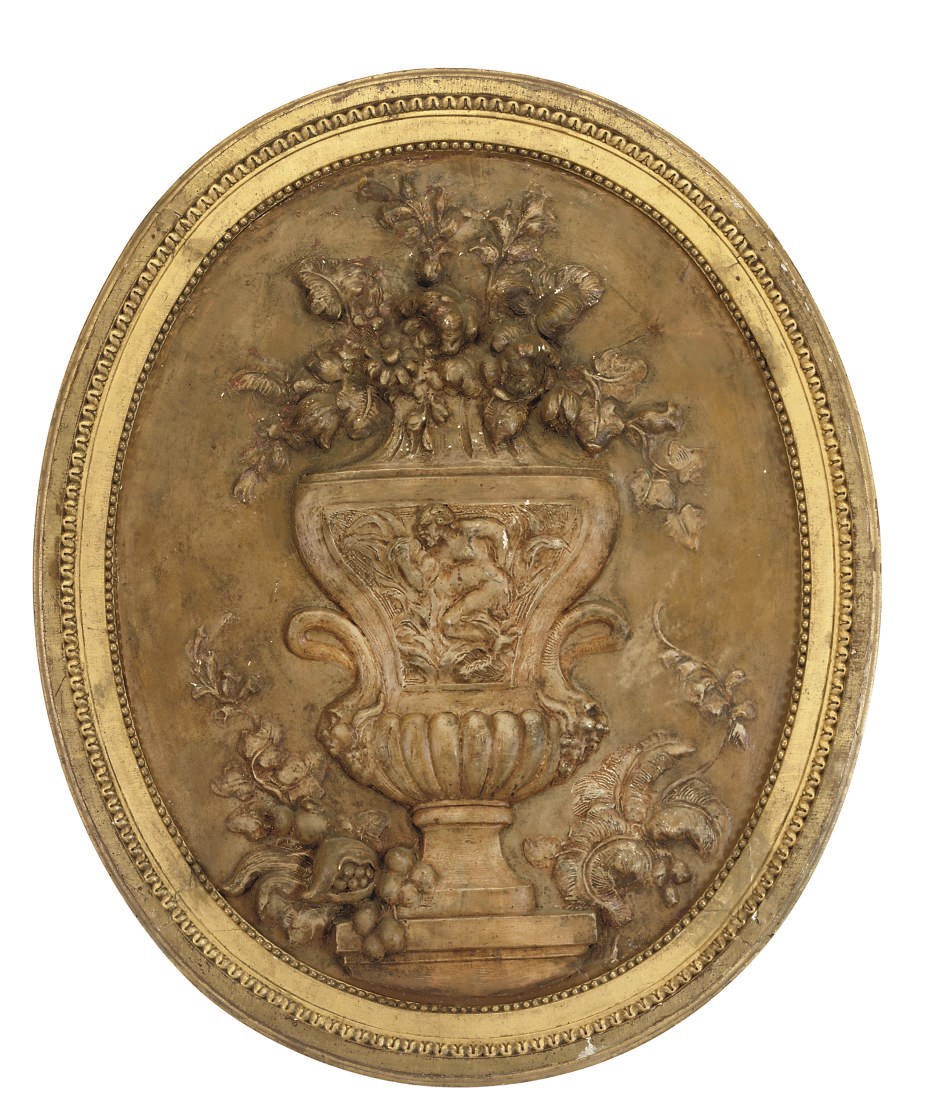 A SWEDISH PAINTED PLASTER OVAL PLAQUE